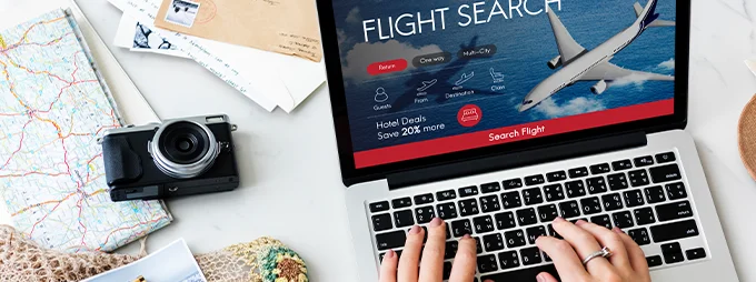 Travel application interface with booking, itinerary planner, and navigation features